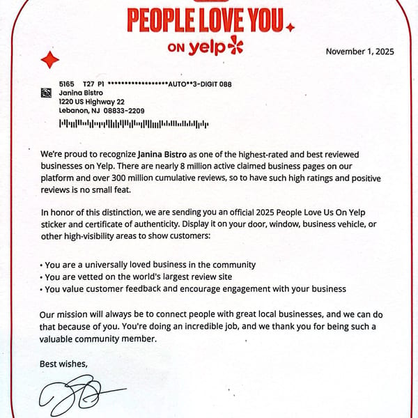 A letter from Yelp congratulating Janina Bistro for being a highly-rated and reviewed business.